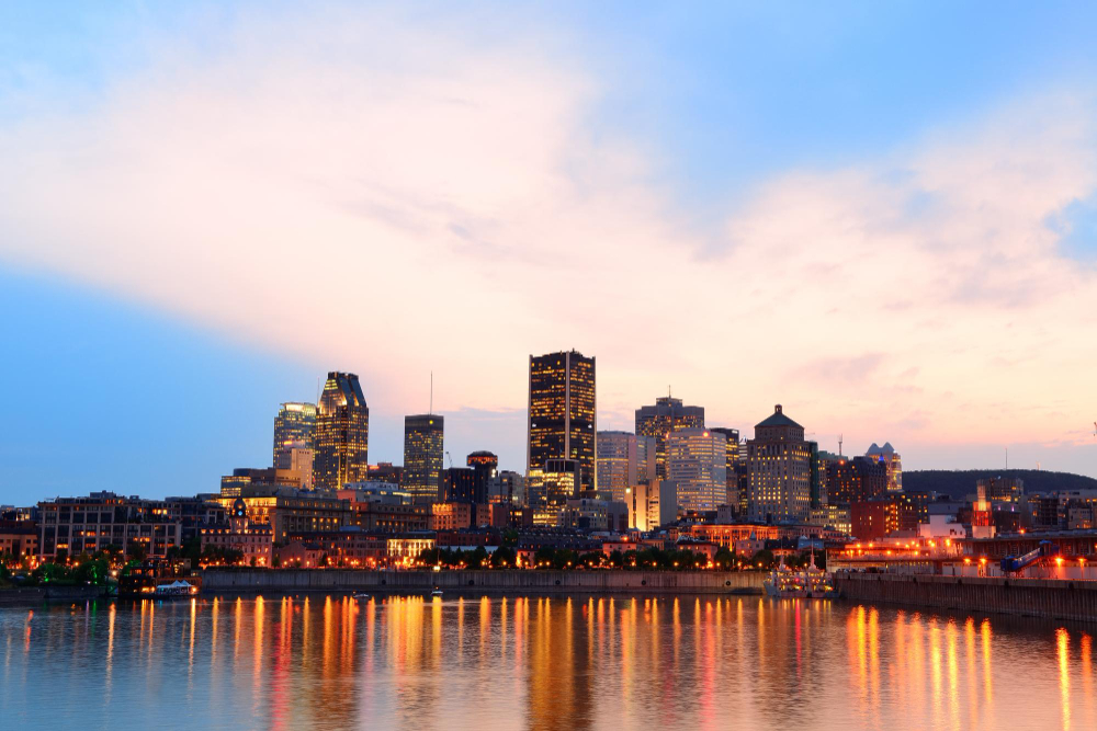 montreal river sunset with city lights urban buildings 2
